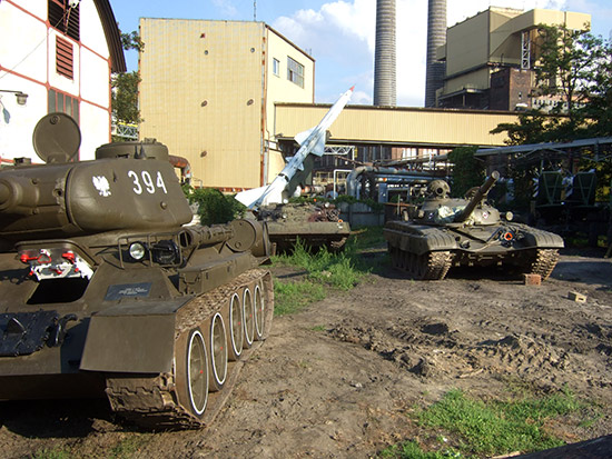 Players in the Printimus Pinball Cup with some of the Soviet military equipment