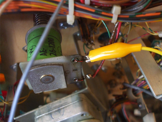 The wires connected with crocodile clips