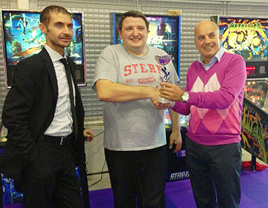 Natale presenting prizes at the Rome Pinball Tournament to Franck Bona with IFPA Italia head, Alessio Crisantemi left
