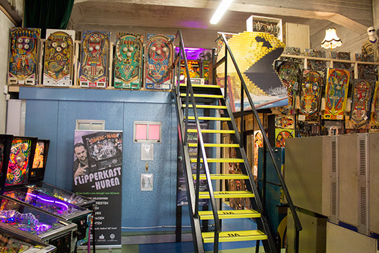Stairs lead up to the electromechanical and flipperless games