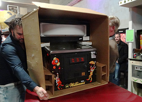 The boxed game is placed on a table