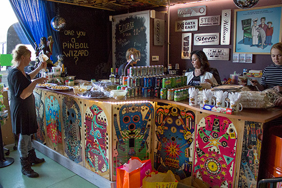 The reception desk with some of the free food and drinks for guests