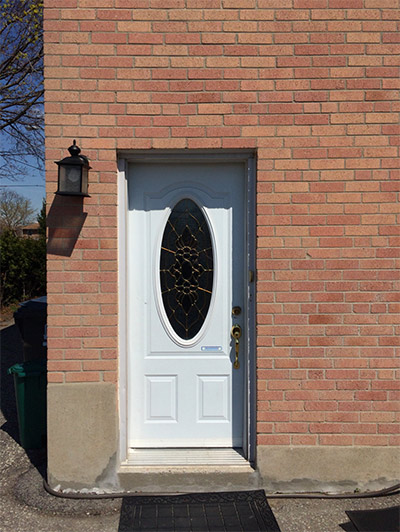 Behind this unassuming residential door is a very exclusive place