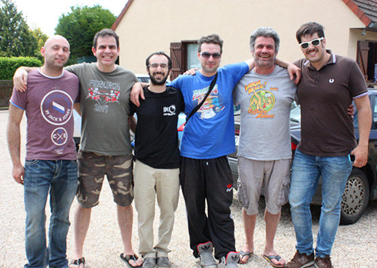 A group photo taken outside in the 33C French sun