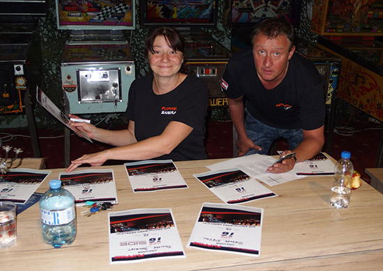 Sandra and Bernd Prucher preparing the tournament certificates