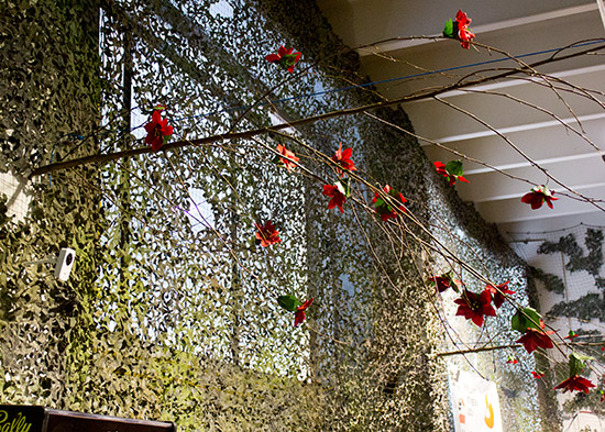 Flowering branches 'grow' out of the walls