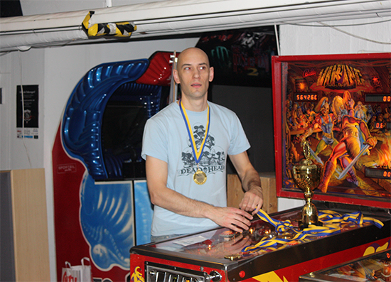 Christian Holmsten gathering medals for the winners