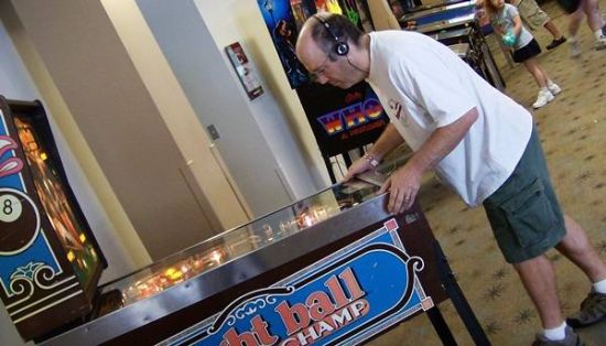 Adam Lefkoff, gives Eight Ball Champ a workout during the pinball tournament qualifiers