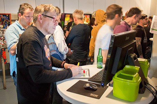 Tournament systems head Ad Jonker at the results terminal