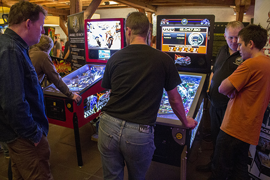 The machine on the right featured the new large backbox display