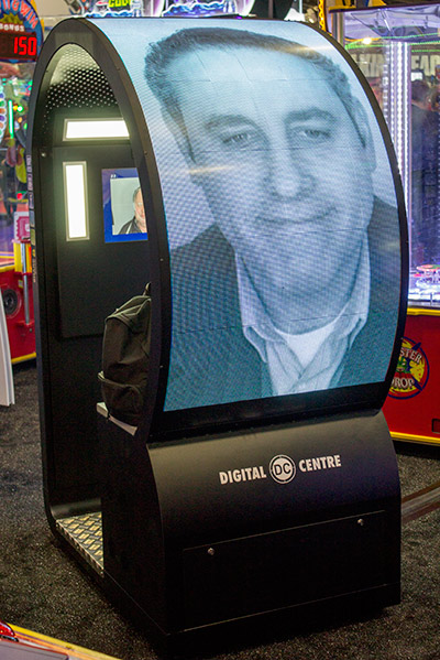 Big screens turned up everywhere, even on photo booths