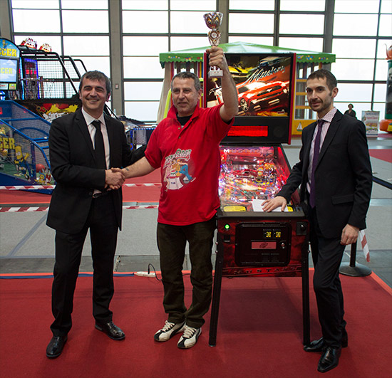 Daniele Baldan, winner on Thursday, with Tecnoplay's Natale Zaccaria and IFPA Italia's Alessio Crisantemi