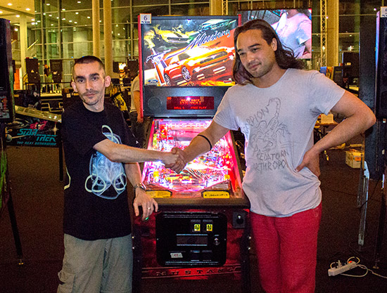 Kriszti&aacute;n and Michael shake hands in the final of the EPC 2014