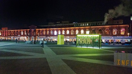 One of the long brick building housing restaurants, bars and shops