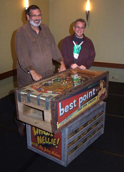Dennis and Greg with their prototype game in 2009