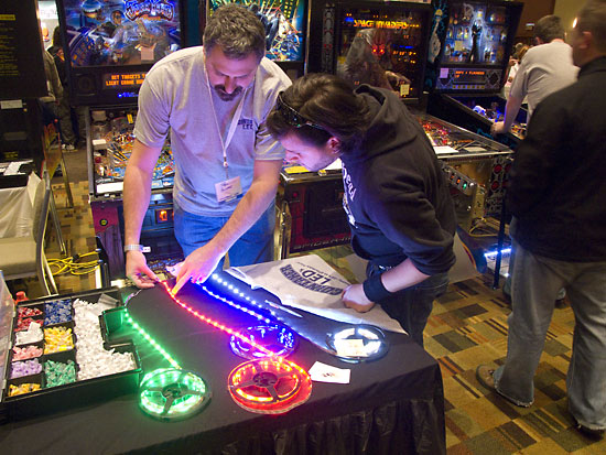 CoinTaker's stand with their demonstration machines behind