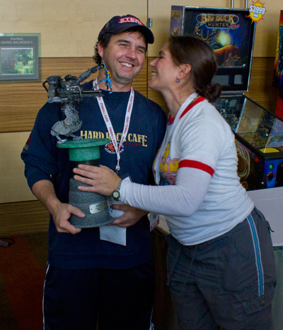 Trent receives his trophy from Karen