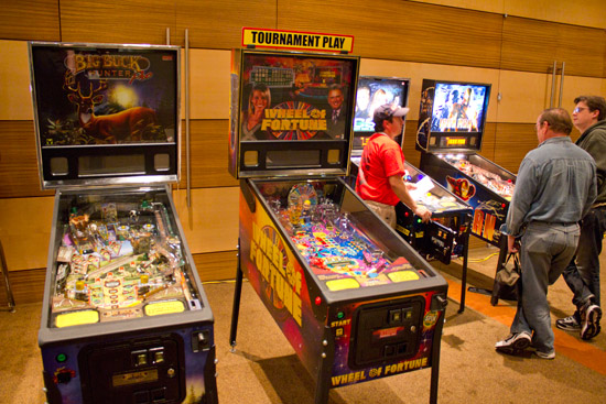 Tournament organiser Trent Augenstein sets up the machines