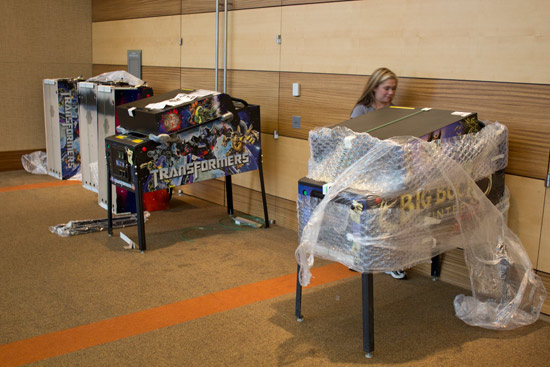 Karen Culp unwraps some Stern machines for the tournaments