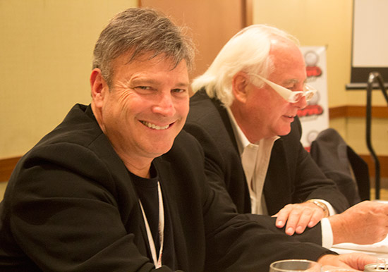 Joe Kaminkow sitting at the top table with Gary Stern