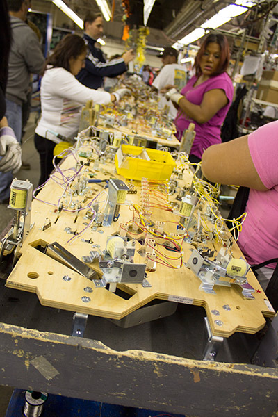 More mechanisms are added as the playfield moves down the line