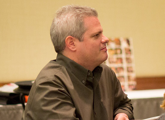 Brian Eddy listens to hisintroduction
