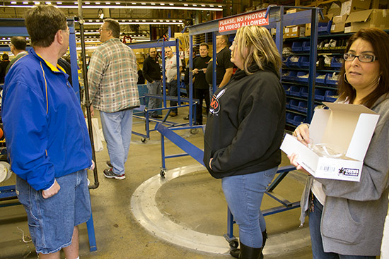 Safety glasses were handed out as visitors entered the factory