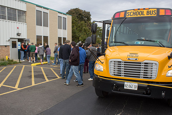 The buses arrive and unload