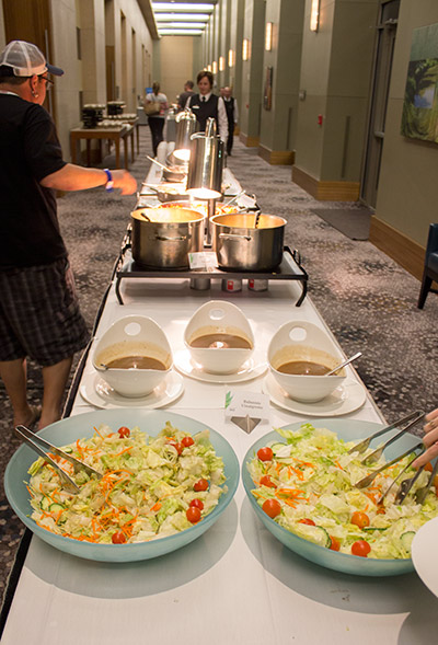 The food contained items such as roast chicken pieces, pasta, salad and chocolate dessert