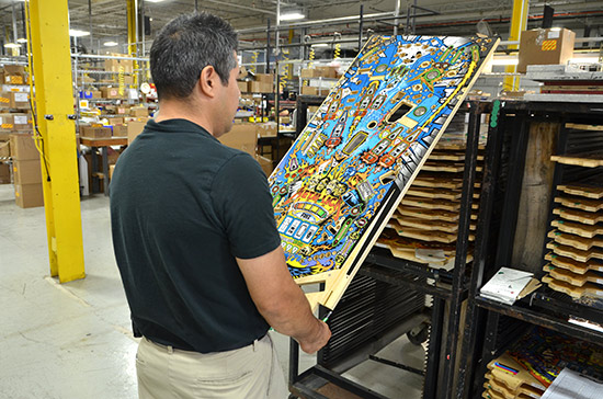 Playfields are inspected and those with printing faults are rejected