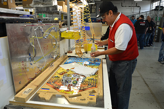 Playfields are then drilled according to a metal template