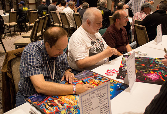 Barry Oursler and John Trudeau sign translites