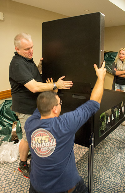Andrew and Stefan set up Alien pinball