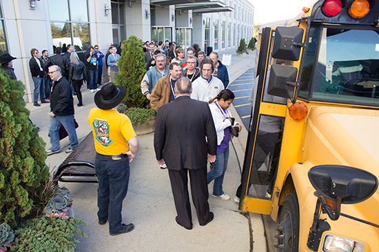 Expo guests board the first school bus