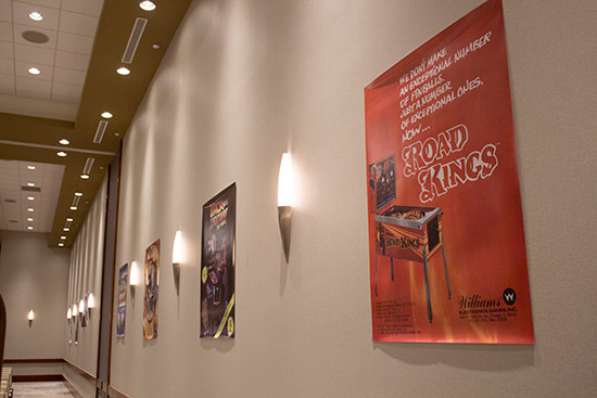 Putting up David's game posters 