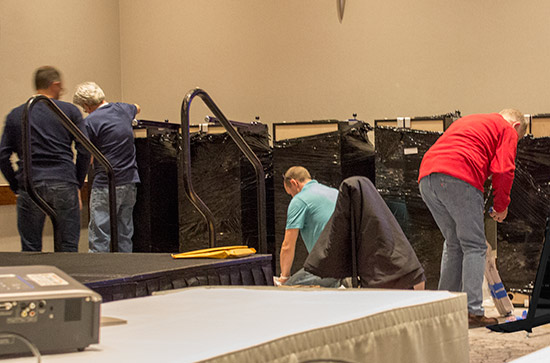 The Jersey Jack Pinball crew setting up machines