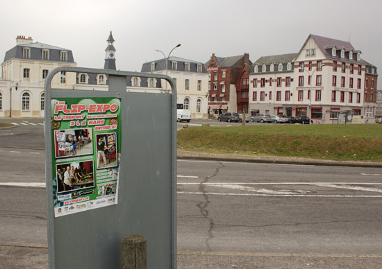 A Flip Expo poster on the rear of a road sign in Le Treport