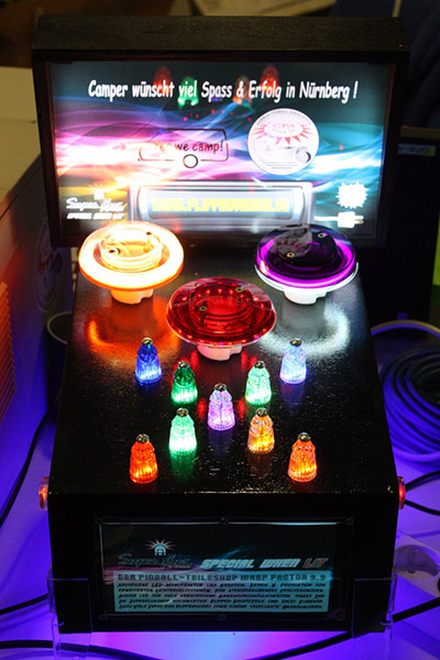 Leave it to German Engineering and bling your machine out with led lit pop bumpers and star posts