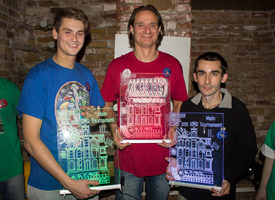 The top three with their illuminated trophies
