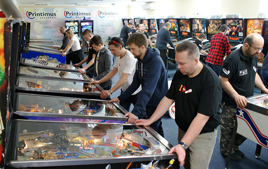 Players try to record a good score on every machine