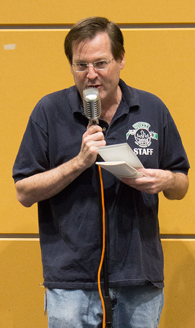 Tournament Director Dave Stewart announces the results