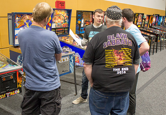 Germain explains the rules to finalists Rob, Thomas and Vincent