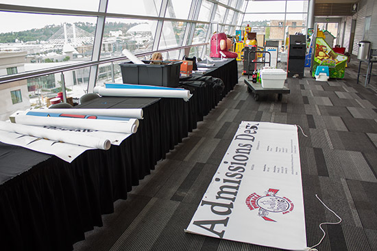 Setting up the registration desk and kids play area