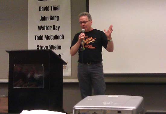 Greg gets up to speak about his involvement with Wizard of Oz