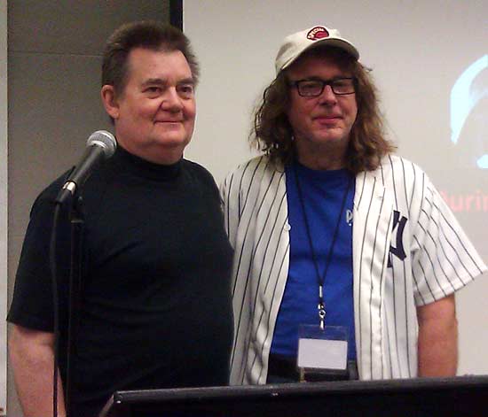 Steve and John Popaduik pose together on the stage
