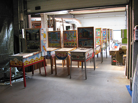 All the bingo's and pinballs waiting for a quick clean and to be put in their place