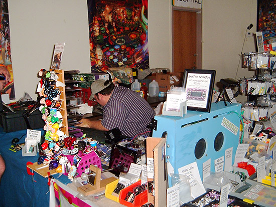Rob Anthony worked his magic at the edge of the EM Room. Great deals too!