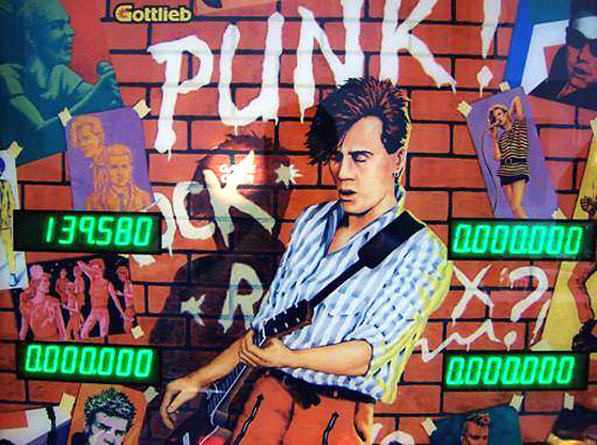 Punk! – Yes, I owned a shirt exactly like that one. Despite the name, the artwork was more new wave than punk. The graffiti'd brick background is classic early 80s style. Where's my VHS copy of Beat Street?