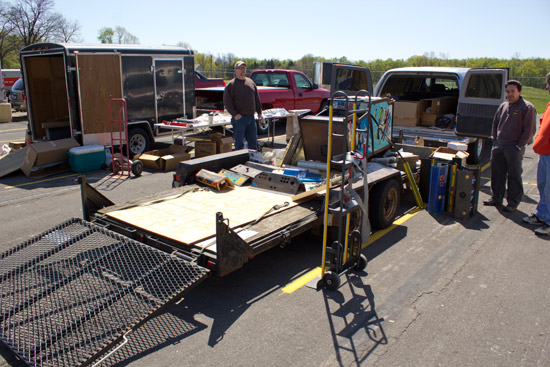 Outside in Saturday's sunshine, Homer and Carlos had more pinball and video game parts
