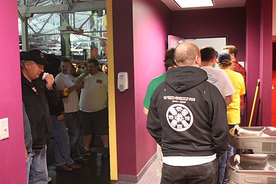 The line for the men's restroom